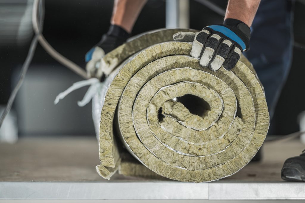 photo of loft insulation roll being laid