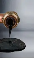 image of sludge coming from an open pipe