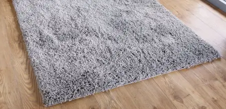 rug over wooden floor