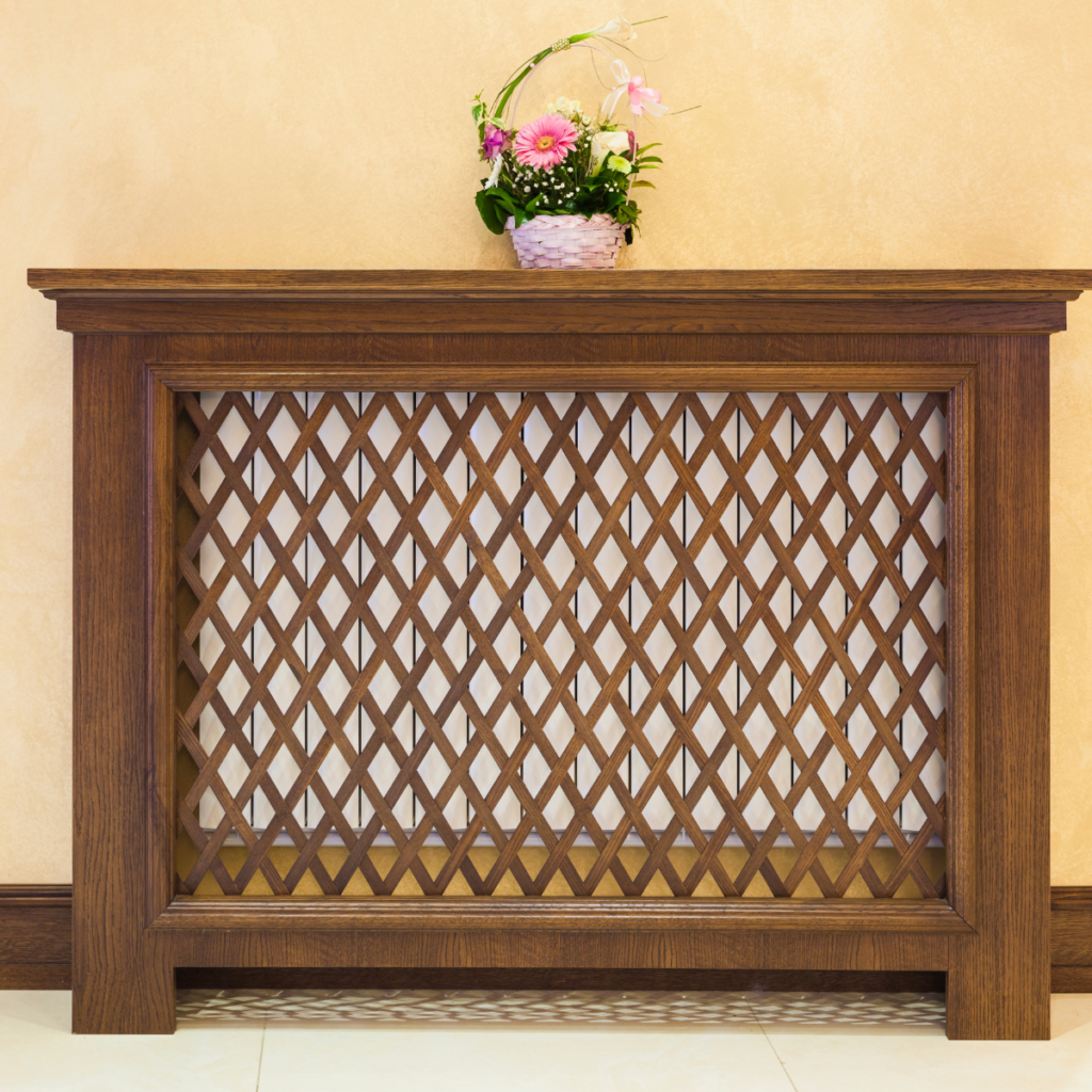 Does a radiator cover block heat? photo of a wooden radiator cover